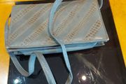Grey Faux Leather  clutch bag .
