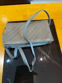 Grey Faux Leather  clutch bag .