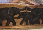 Hand carved wood.