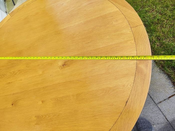 Solid round wood table