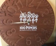 100 Pipers Bar Clock