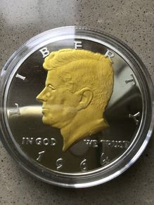 Uncirculated commemorative coin - John F Kennedy Dollar