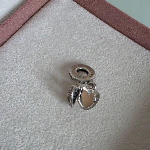 Pandora locket angel wings,with enamel dangle charm very good condition