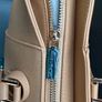 Brand new U.S. Polo Assn. Jones camel tote bag with tags. Image 5