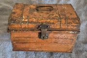 Small vintage metal trunk.