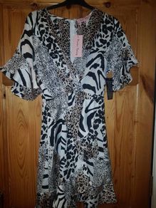 Pixie Daisy Leopard Print Dress