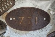 Railway carriage plate