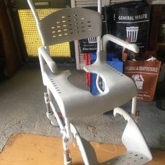 Disability adjustable height shower chair.