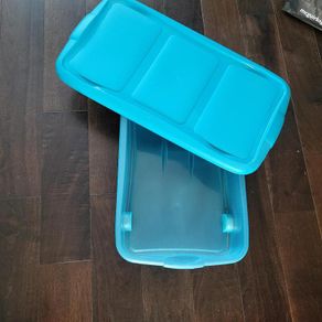 Blue underbed storage with castors