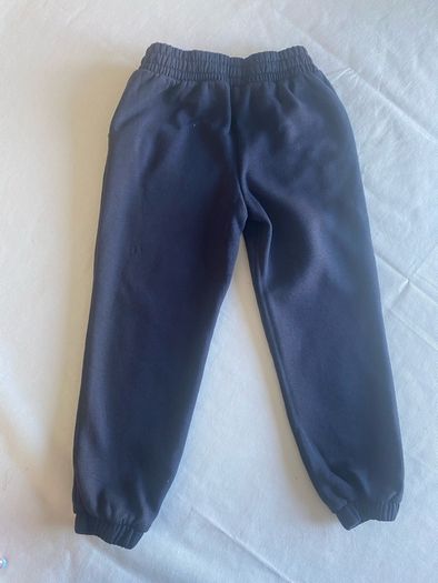 Dunnes navy tracksuit bottoms (age 6-7)