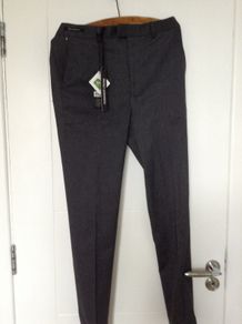 New Grey trousers waist. 32 in inside leg 33 in EUR size 42