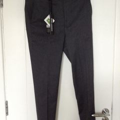 New Grey trousers waist. 32 in inside leg 33 in EUR size 42