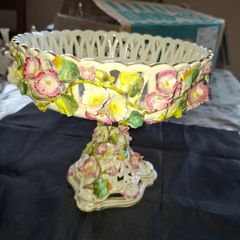 Antique German Porcelain Compote, likely from the Von Schierholz or Carl Thieme factory in Dresden, featuring hand-painted and encrusted floral decorations featuring intricate reticulated pierced basketwork and raised, hand applied flowers., postage avail