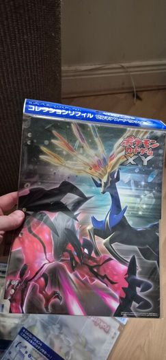 pokemon xy binder and 3 packets of inserts