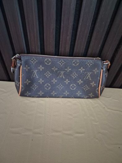 Louis vuitton vintage eva clutch