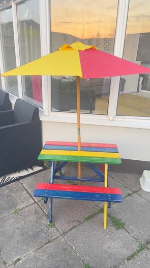 Picnic table with parasol
