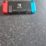 Nintendo switch with games and accessories Image 3