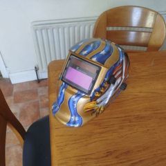 light to dark welding helmet
