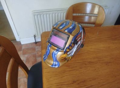 light to dark welding helmet