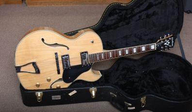 Washburn J3 guitar with hard case