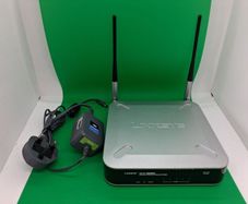 Postage - Linksys Cisco WET200 Wireless Ethernet Bridge Router.