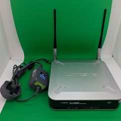 Postage - Linksys Cisco WET200 Wireless Ethernet Bridge Router.