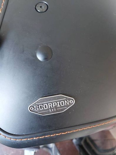 2 jackets and scorpion helmet