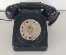 1970s black rotary dial telephone PROP