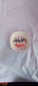 carslberg ashtray,,good condition,,pitting on glaze,,overall good, thank you, collectors item, handy for man cave, home bar etc, if buyer collects cheaper .take as is .