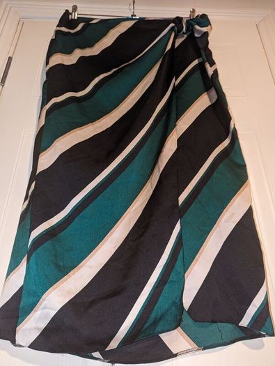 Perfect for Summer. Stunning wrap effect multi colour midi skirt