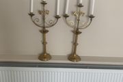 Impressive pair of brass candelabra, 64 centimetres high, 34 centimetres wide