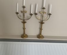 Impressive pair of brass candelabra, 64 centimetres high, 34 centimetres wide