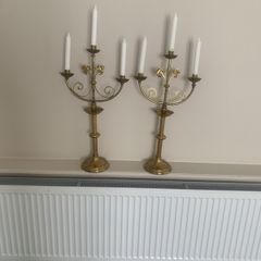Impressive pair of brass candelabra, 64 centimetres high, 34 centimetres wide