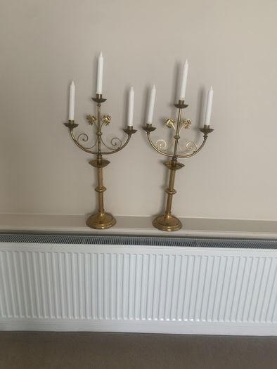 Impressive pair of brass candelabra, 64 centimetres high, 34 centimetres wide