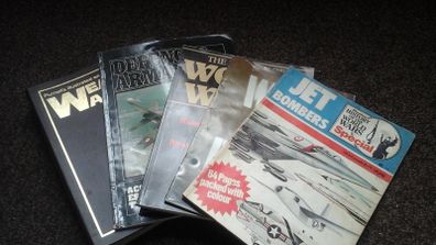Old war and weapon magazines