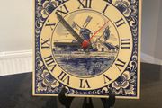 Blue tile clock with windmill