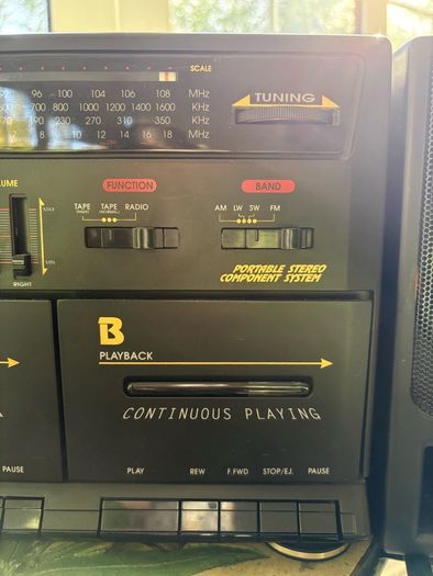 Radio and double cassette machine with speakers