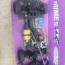 R/C Subaru car for parts + 2 controls Image 3