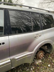 Mitsubishi Pajero 2006 passenger side rear door complete with glass