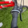 Red Woom 4 Kids Bike Barely Used for Boys and Girls Image 3