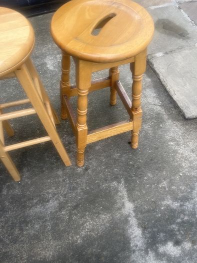 2 solid wood bar stools.