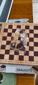 Traditional Draughts (checkers) board game set the board is chess olso..