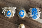Three Kazakh Police Badges