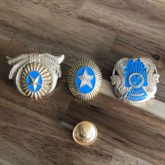 Three Kazakh Police Badges