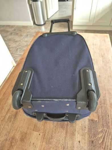 small navy suitcase
