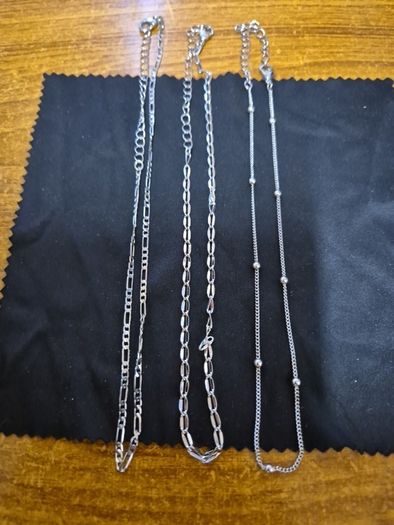 3 silver colour chains