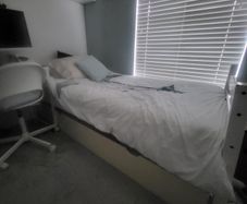 SIngle wood framed bed and mattress