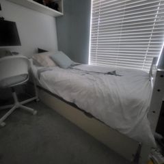 SIngle wood framed bed and mattress