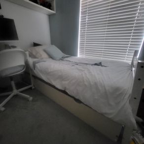 SIngle wood framed bed and mattress
