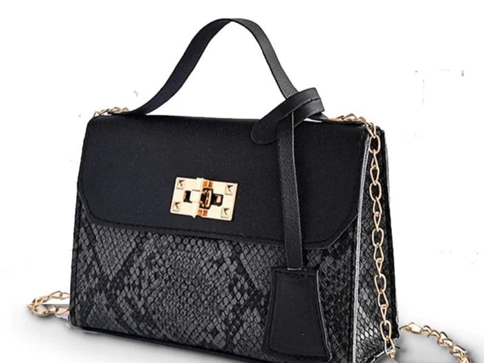 Black snakeskin twist lock bag